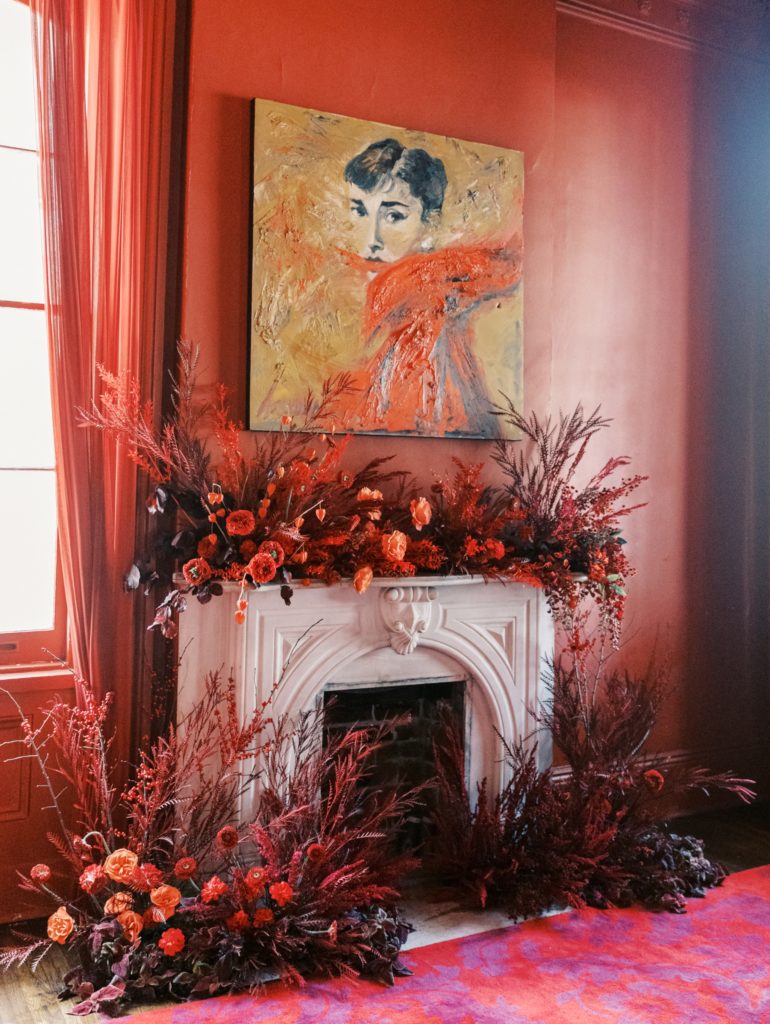 The Audrey Hepburn painting hanging over the fireplace at Kingsway Studio.