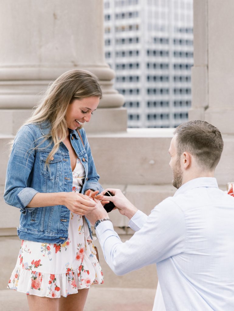 Couple getting engaged at the cupola at London House